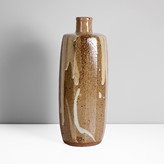 A brown stoneware bottle vase made by William Marshall in circa 1990 sold at auction by Maak